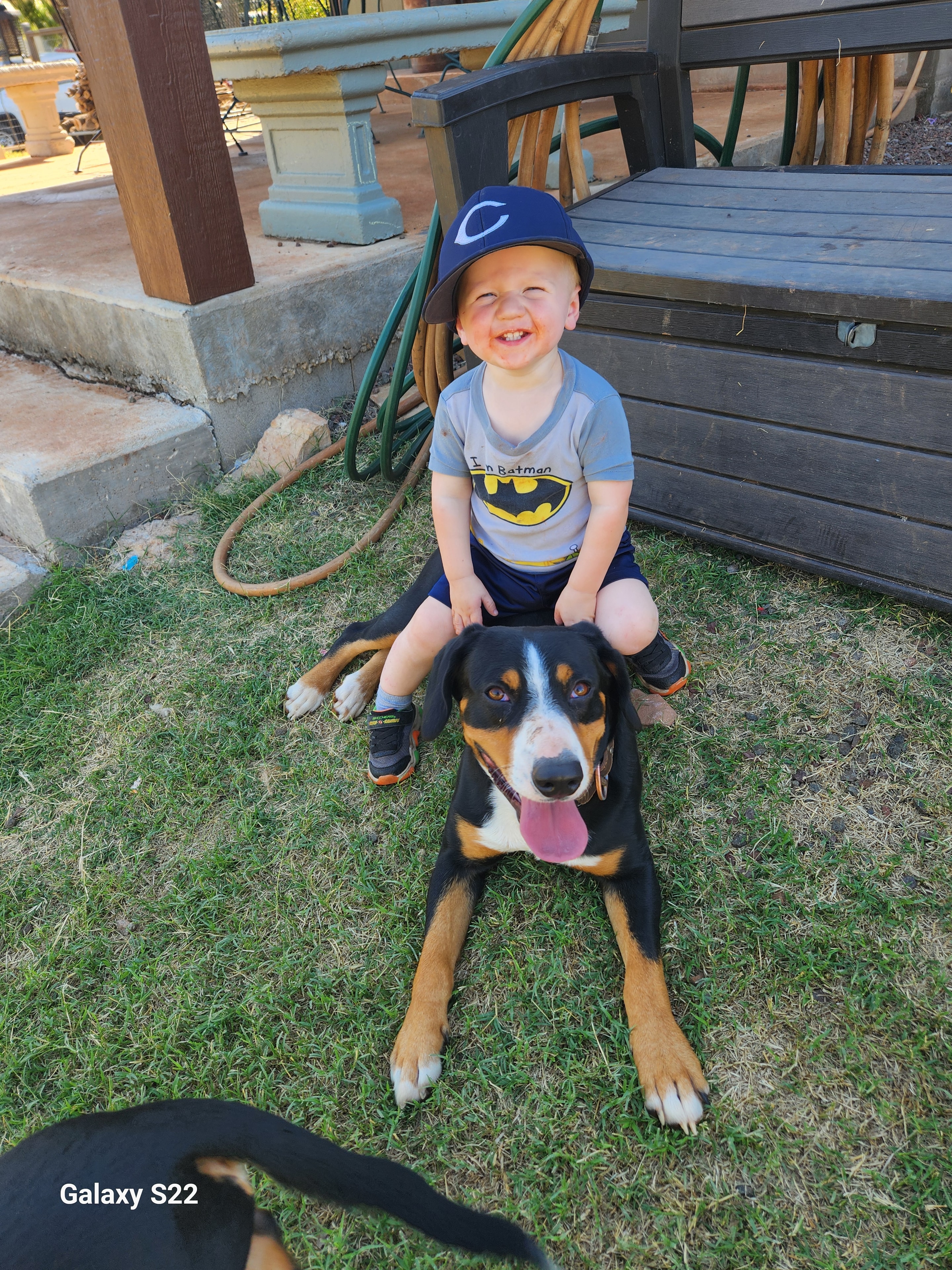 Family with Entlebucher Mountain Dog puppy